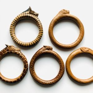 African Carved Wood Bracelets, Set of 5. Each features a different animal, Lion
